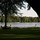 Looking at Mississippi River and a speedboat going by.