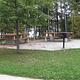 Picture of picnic tables and grills.