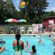 Families enjoying the campground swimming pool