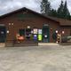 Log cabin office with outdoor merchandise display
