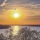 Sunset/lake panorama used on the homepage background; illustrates the nearby Lake of the Ozarks view and scenic setting promoted by the resort.