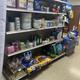 Interior view of the convenience store with camping supplies and snacks at Trailin RV Park.