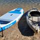 Close-up of paddleboard and kayak at the sandy waterfront — representative of the property’s watercraft and beach facilities (source page: /waterfront/).