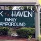 Entrance sign reading 'Oak Haven Family Campground' — good identifying shot of the property entrance displayed on the site homepage.