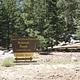 View of Boulder Basin Campground with campground sign.