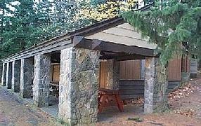 Picnic shelter with stone pillars.
