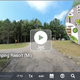 Screenshot of the campground virtual tour interface showing a roadway view and a site map inset — functions as an aerial/overview reference for the campground layout. Sourced from the site’s virtual tour content.