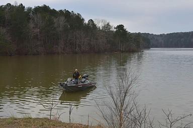 Clear Creek Public Boat Ramp - A man with his 2 best friends, his dog and his fishing boat