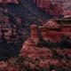Red canyons with green trees