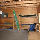 A view of bunks and bench inside Esker Stream Cabin (Wrangell-St Elias)