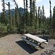 Marion Creek Campground campsite with picnic table and fire ring.