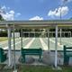 Shuffleboard courts with covered seating — useful photo of another outdoor activity area on the property.