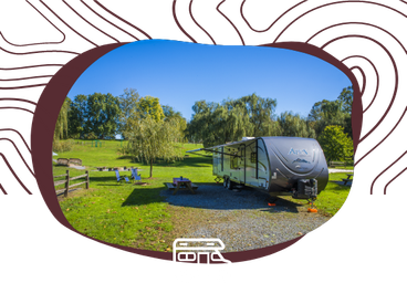 Framed image of an RV parked at a gravel site with picnic table and open lawn — directly represents RV sites and matches the RV Sites section on the accommodations page.