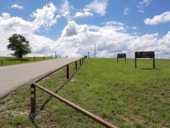 Longhorn Park entrance driveway and park sign