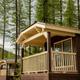 Close exterior shot of cabin porches (multiple cabins visible) — shows the park’s cabin accommodations and building style included on the property gallery.