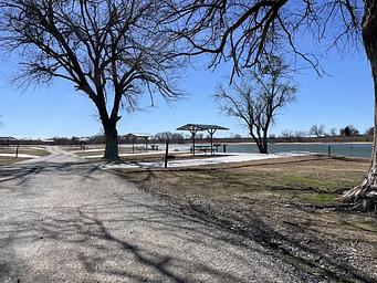 A photo of facility BURNS RUN EAST with Picnic Table, Electricity Hookup, Fire Pit, Shade, Water Hookup