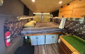 Custom van build out: Unique wrap; diesel heater
