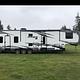 Luxurious Toy-hauler with 3 slides and 14' garage.