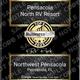 Entrance sign photograph identifying Pensacola North RV Resort on-site; useful for wayfinding and property ID (prominent sign image on homepage and gallery).