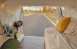 The Timber Den — Cozy Cabin Camper with Solar