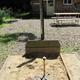 Horseshoes/sandpit and picnic table close to a building — depicts on-site recreation and campsite furnishings. Source: Gallery page image on the campground website.