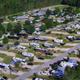 Aerial overview showing rows of RV sites along the riverfront and roads on the property — good overall layout image; found on the site as 'overview.jpg' (homepage background).