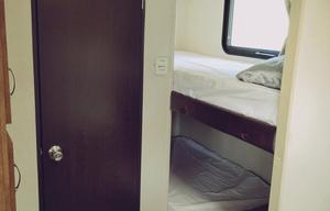 Meet Judy, retro themed camper w/ bunks to sleep 5