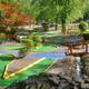 Mini-golf course on property with landscaping and nearby buildings — shows on-site recreation area from the resort's image set.
