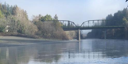 View of the Russian River with a nearby bridge — shows river access and nearby scenery. File is used on the campground’s reservations page, supporting relevance to the property.