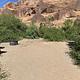 There is one picnic table and fire ring with views of the Colorado river and high sandstone cliffs.