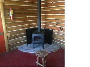 The woodstove inside Priest Rock Cabin