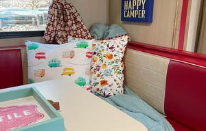 Step back in time in this charming vintage camper!