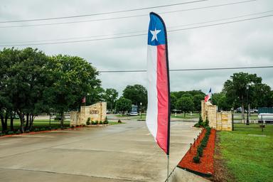 A red white and blue flag with a blue star on it