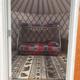 Interior of a yurt/cabin with bunk bed and entrance mat — shows on-site lodging amenities (yurt) advertised on the site and provides an interior facility view.
