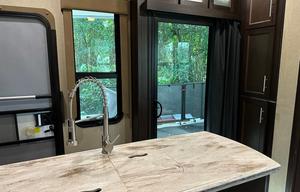 42’ Luxury Toyhauler with rare Side Patio