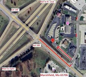 Annotated satellite/ aerial map view showing the RV park footprint, adjacent highway ramps and surrounding properties — useful to illustrate location and site layout in relation to nearby roads and exits.