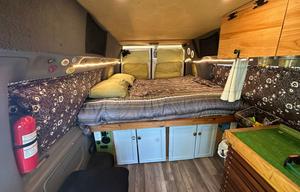 Custom van build out: Unique wrap; diesel heater