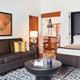 casita guest room living space with murphy bed and couch