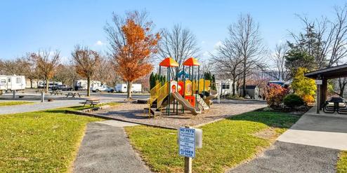 Colorful playground in RV park with slides