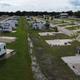 Drone/overhead image of the RV park showing multiple full-hookup pads, driveways and site spacing — useful close aerial for guests. File originates from the accommodations page.